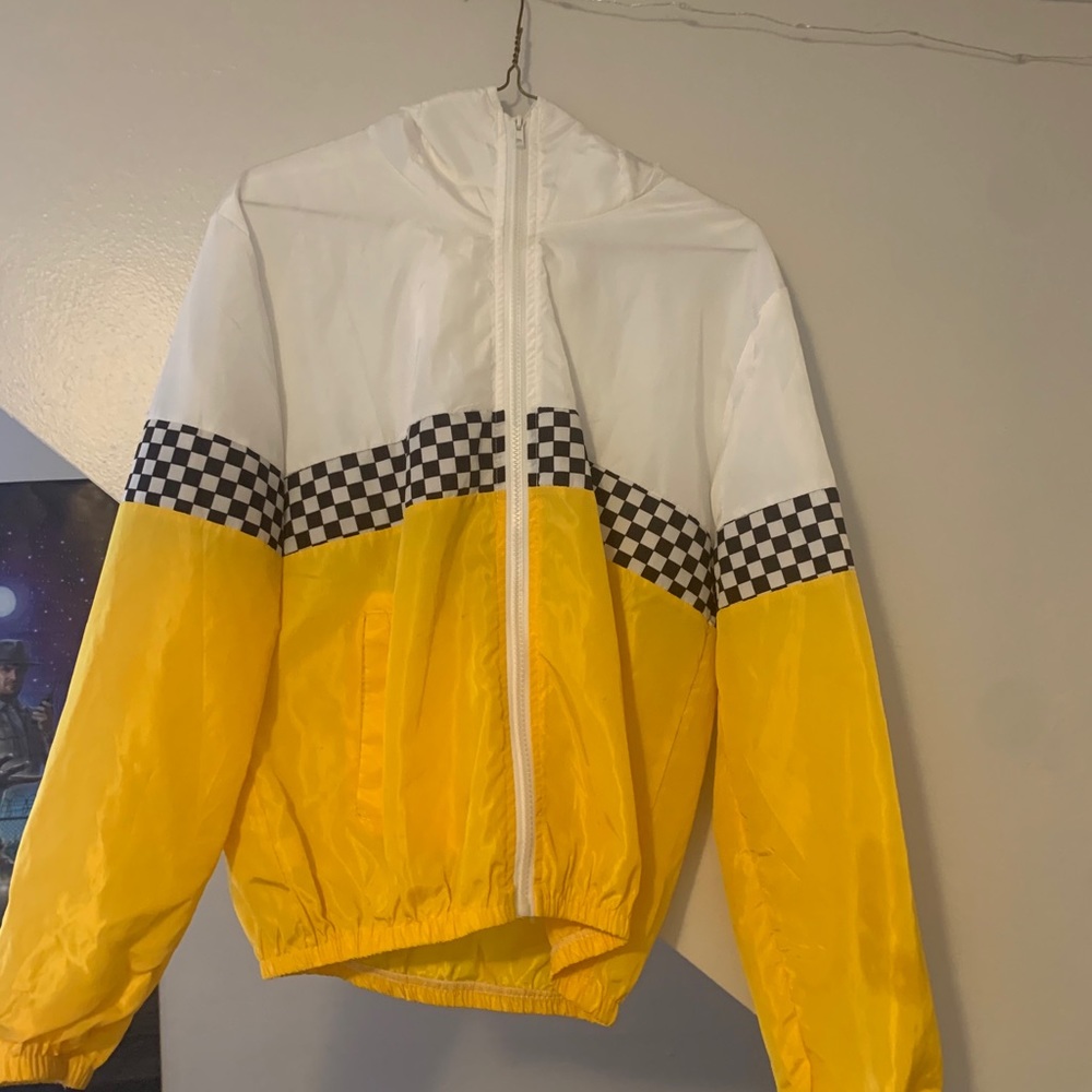 white and yellow checkered rain jacket